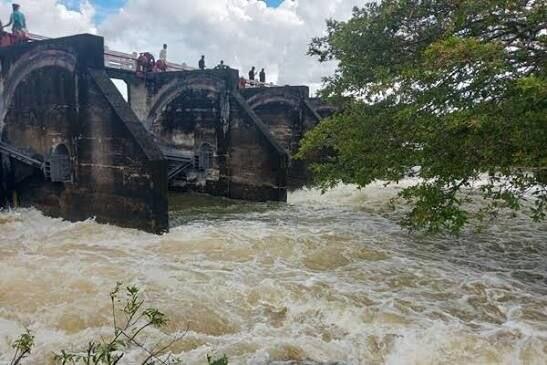 Heavy rain opens reservoir spill gates, landslide cuts rail line