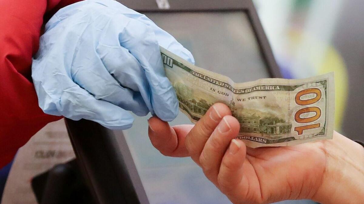 Police warn of cash exchange scam at ATMs and deposit machines