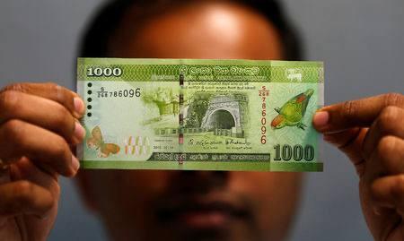 Rupee falls 6.8% to Rs. 332.61 per dollar this year, Central Bank says